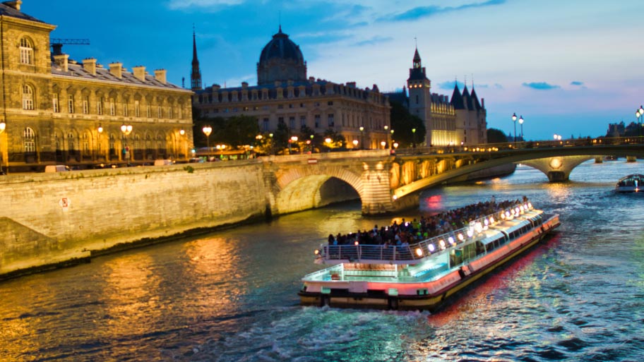 Bateau Mouche at Night along the Seine River