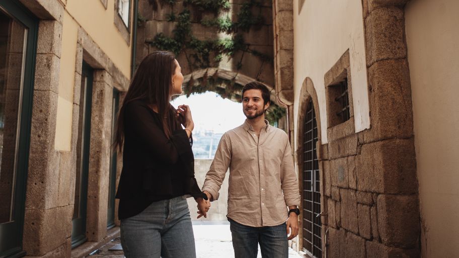 Young couple walking in Porto, Portugal