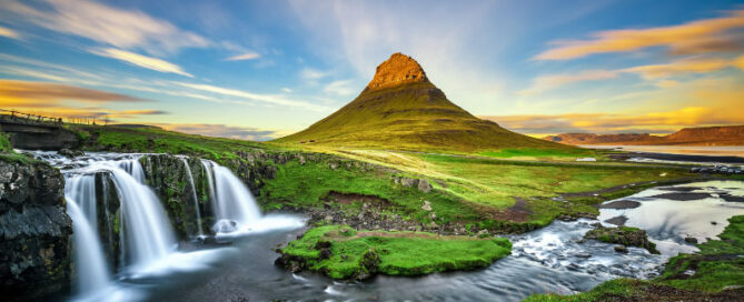 Sunset over Kirkjufellsfoss Waterfall in Iceland - Iceland Travel Guide
