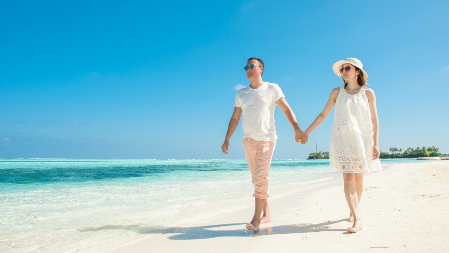 A Couple Walking at the Beach in Mexico