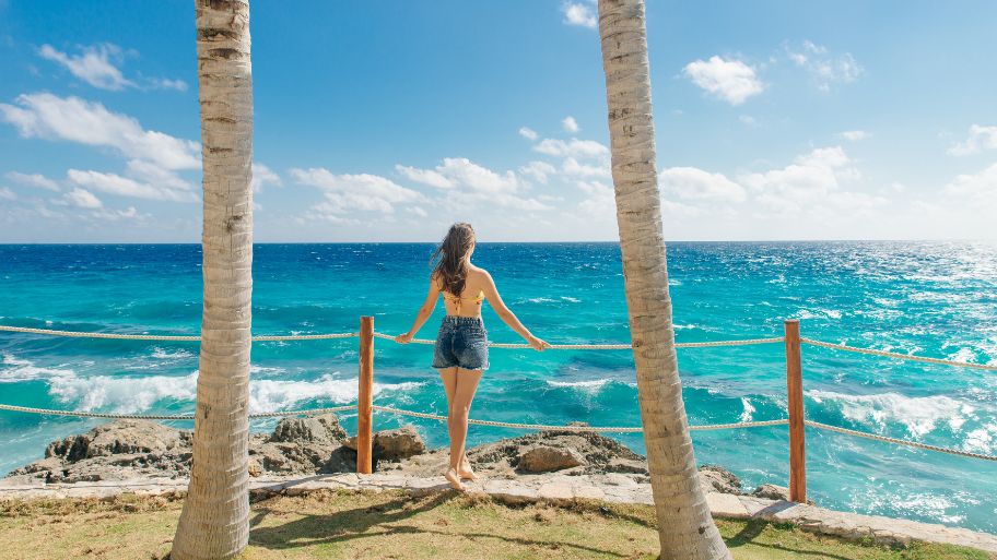 Cancun, Quintana Roo, Mexico. Girl on Gaviota Beach in Cancun