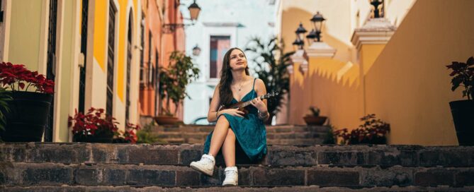 A bride-to-be enjoying a quiet moment in Old San Juan — a vibrant setting perfect for a Puerto Rico destination wedding planned with Allied Travel in San Juan, PR